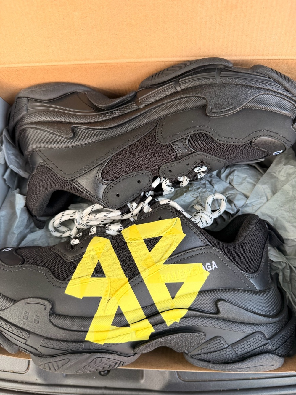 Balenciaga Men’s Black triple S Sneakers with Yellow Graphic